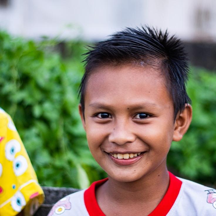 Kaveri Mehta, Lead Design Curator at MintGroveField, reviewing corporate floral arrangements